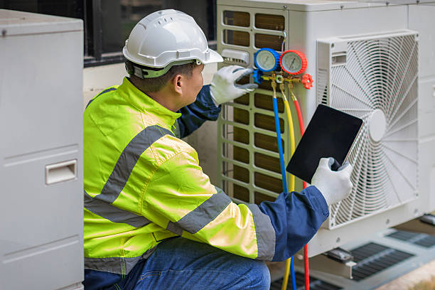 Professional Emergency Hvac Repair technician working in Leawood, KS